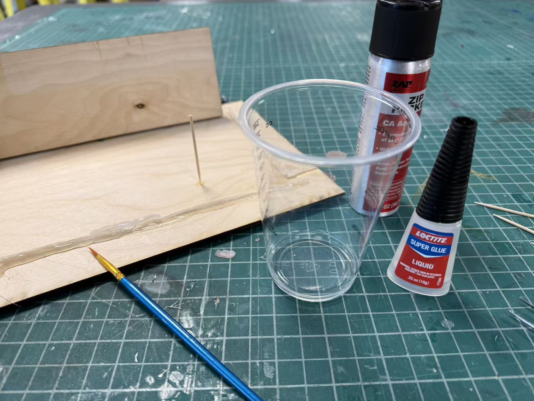 Testing superglue and activator technique on scrap plastic