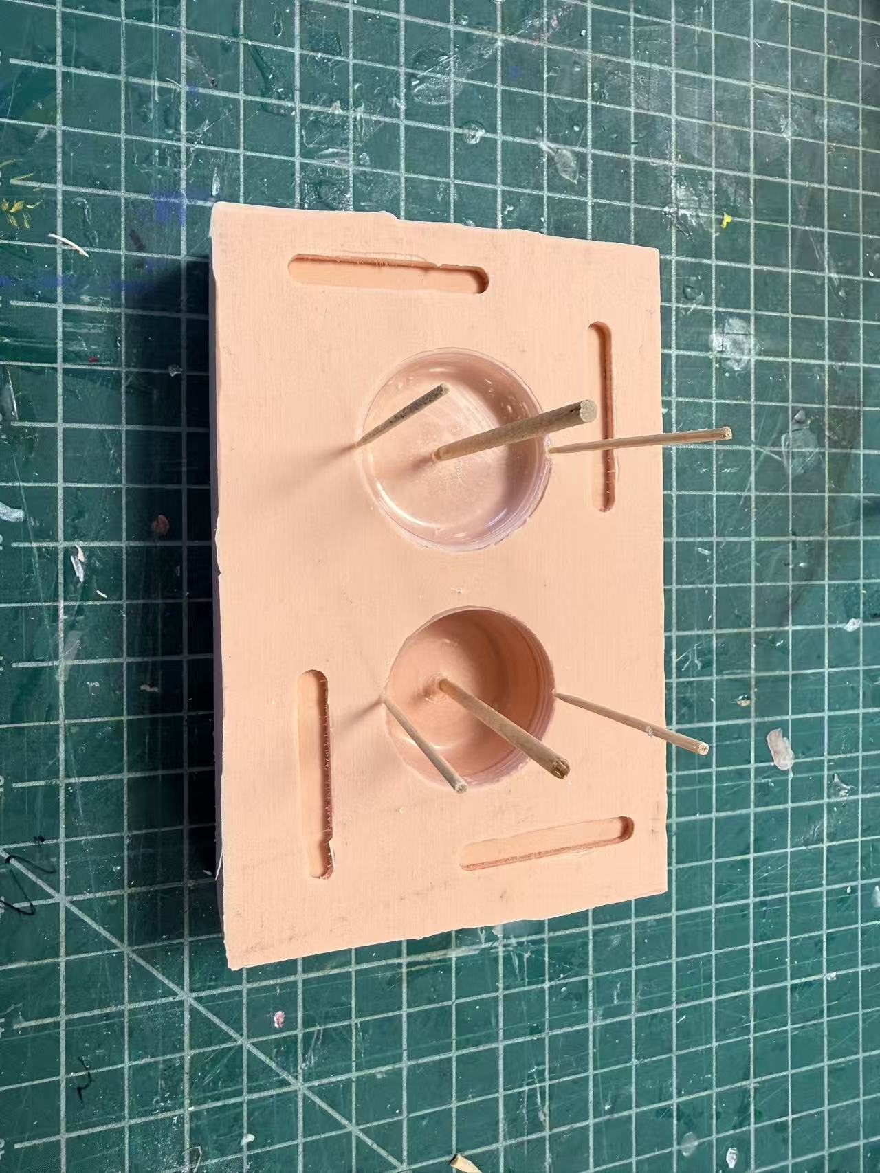 Toothpick vent core and wood stick sprue core attached