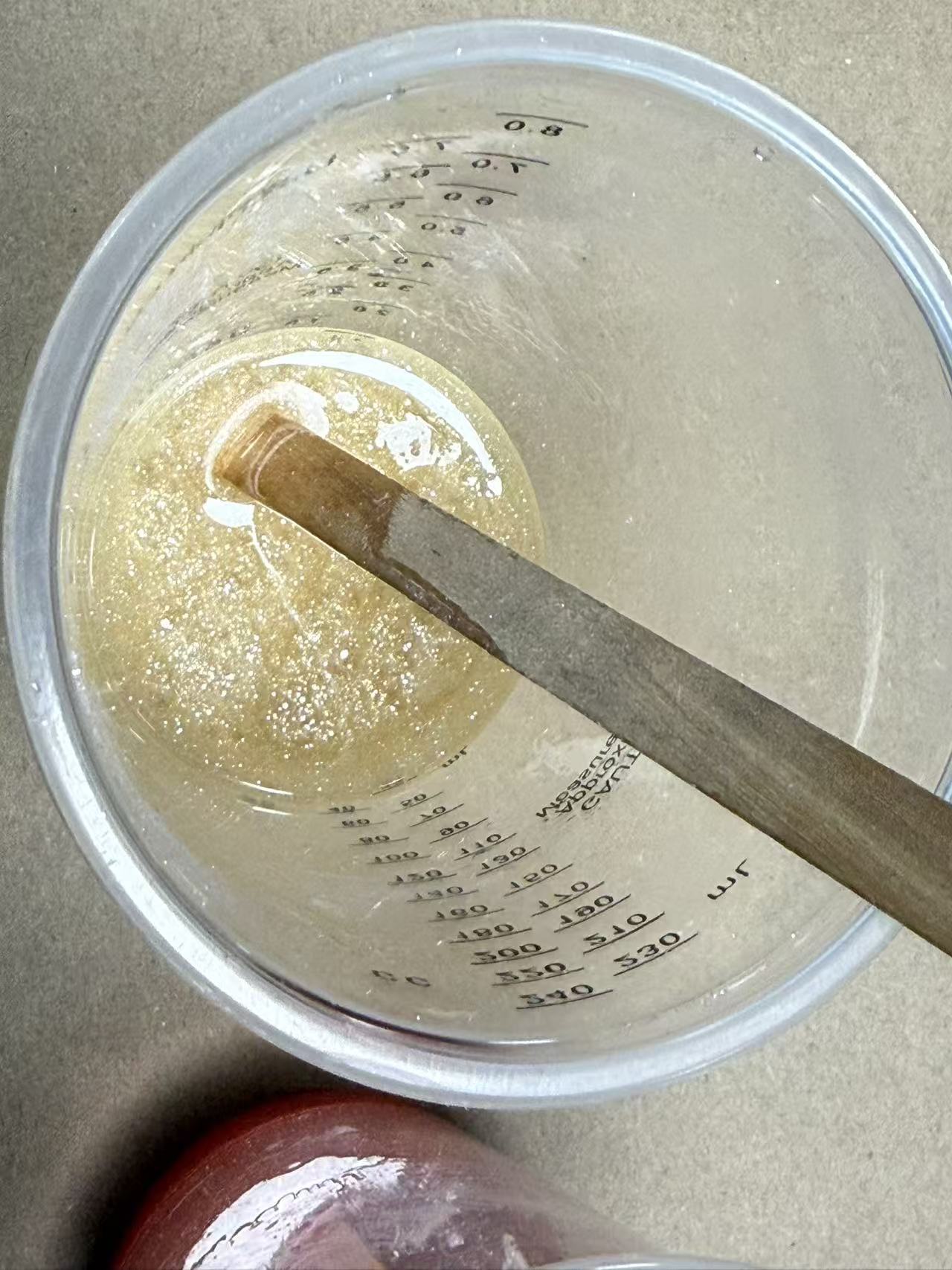 White and gold glitter resin mix
