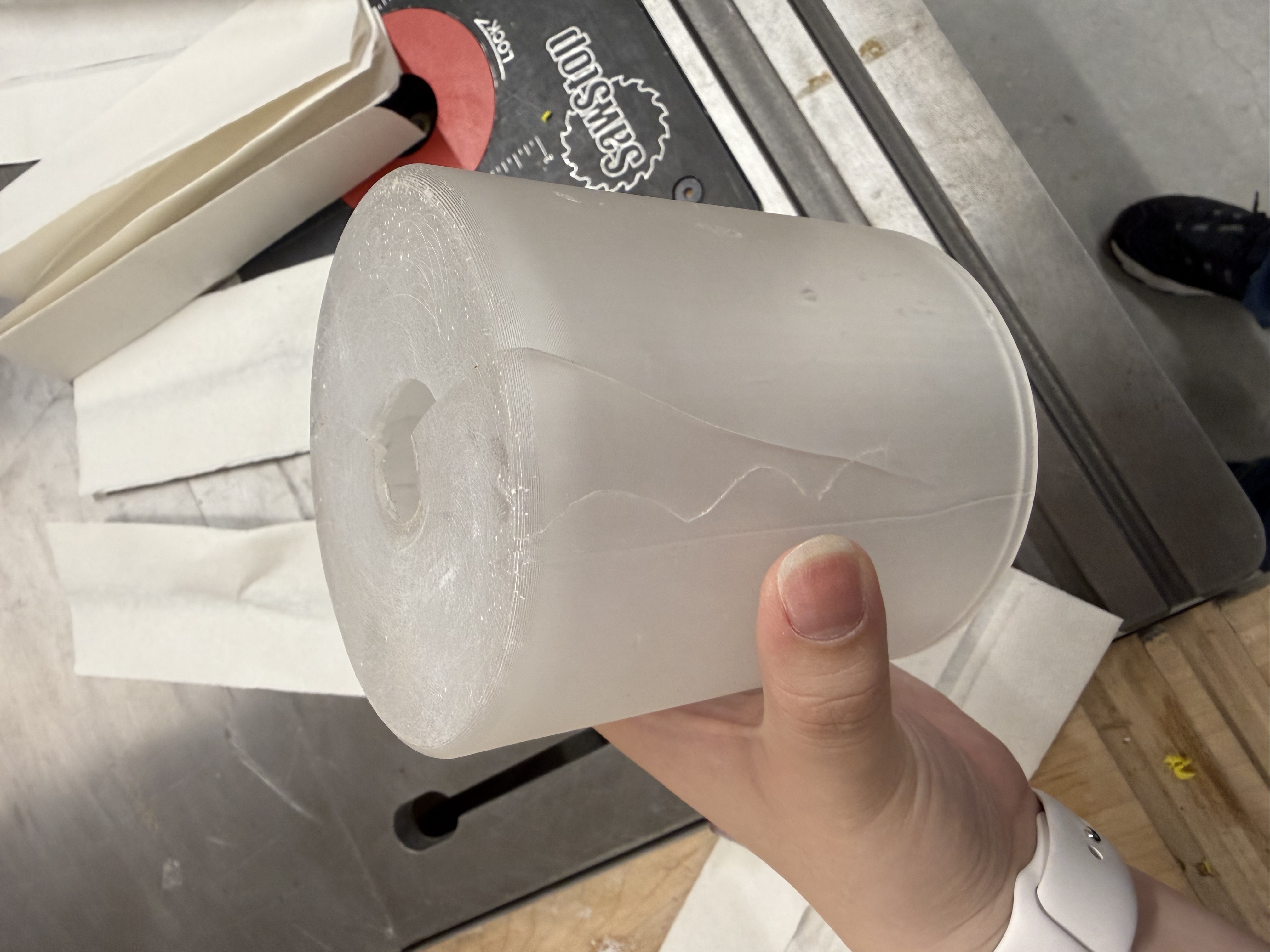 Resin lid cracked radially from drilling