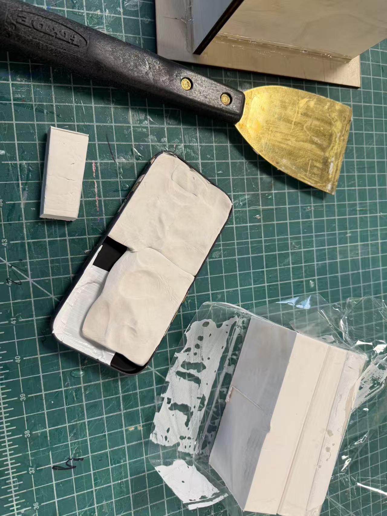 Phone case filled with clay